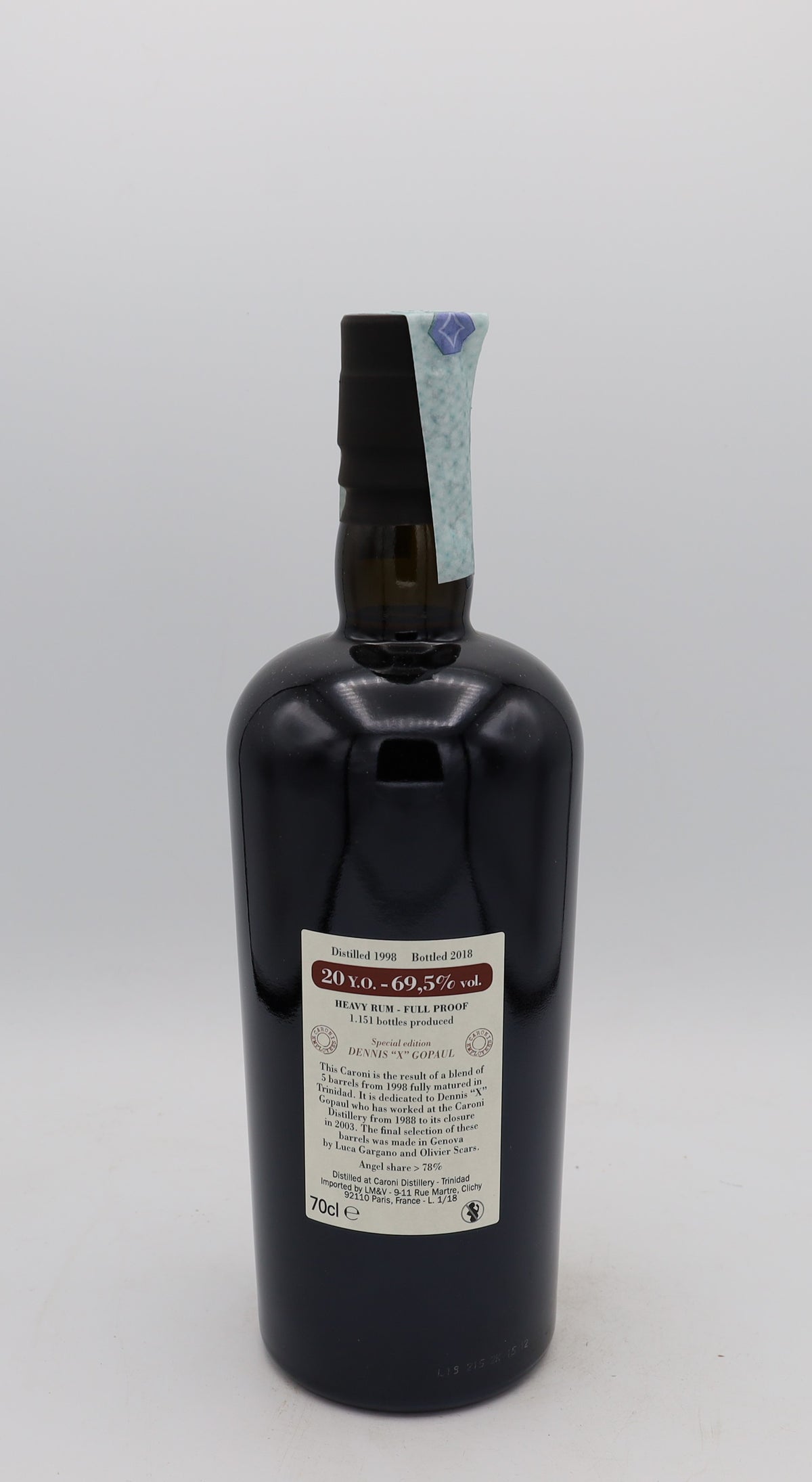 A Caroni 1998 Rum Special Edition Dennis X Gopaul, 20 years old, in a collector’s box – rare aged Caribbean rum with rich, complex flavors.