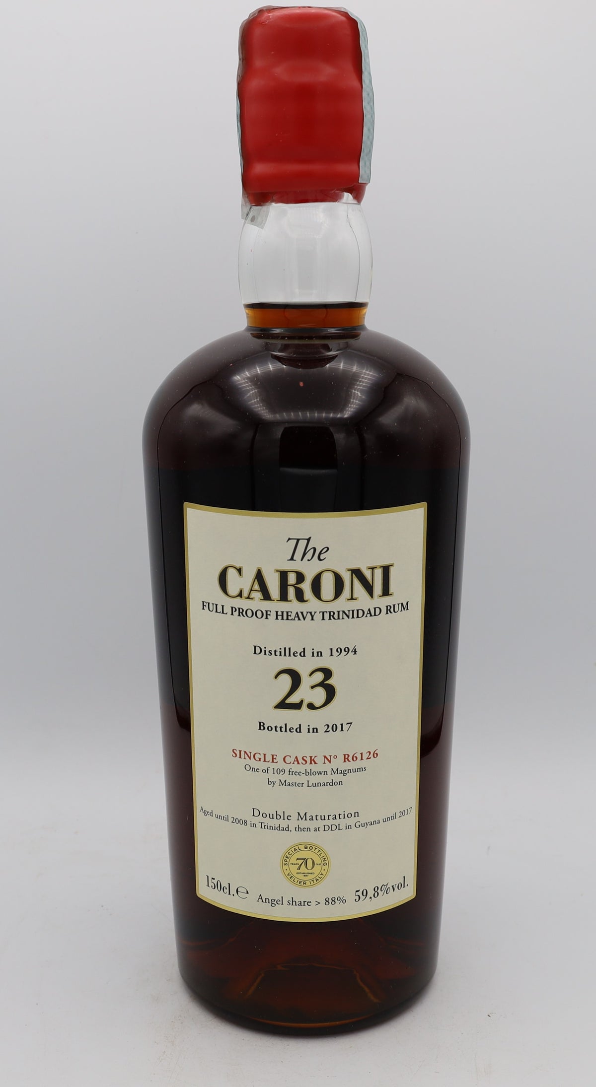 Caroni Rum Single Cask R6126 Magnum, 23-Year-Old Vintage 1994, presented in a Vélier collector’s gift box – rich, aged Caribbean rum with deep, complex flavors.