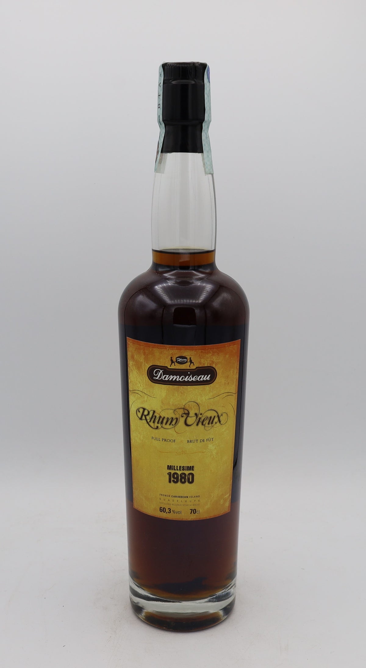 A Damoiseau Rhum Vieux Millésime 1980 Brut de Fut, Reserved Treasures Club edition – rare vintage rum with rich, complex flavors, presented for collectors.