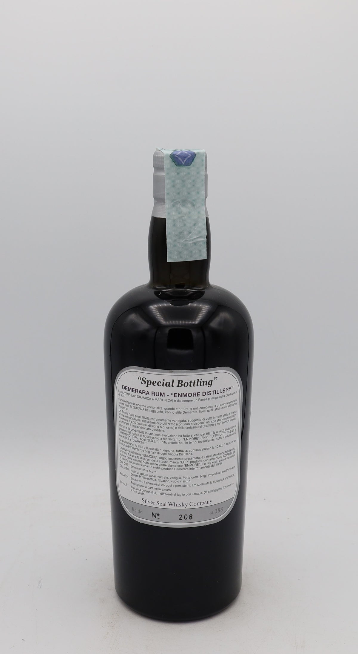 An Enmore 1977 Demerara Rum Ernst Knam Silver Seal, bottle 208, presented in a collector’s box – rare aged Caribbean rum with rich, complex flavors.