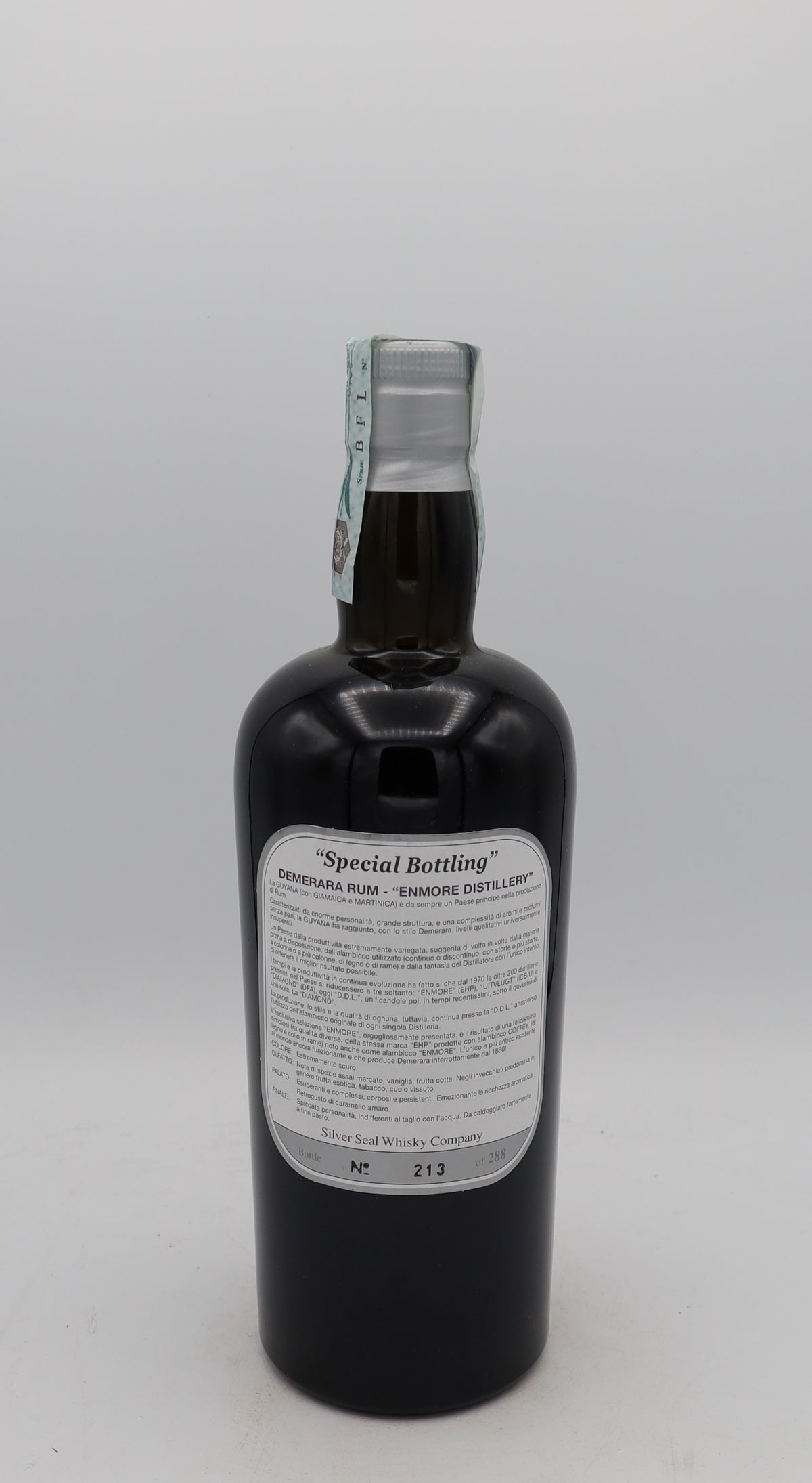 An Enmore 1977 Demerara Rum Ernst Knam Silver Seal, bottle 213, presented in a collector’s box – rare aged Caribbean rum with rich, complex flavors.