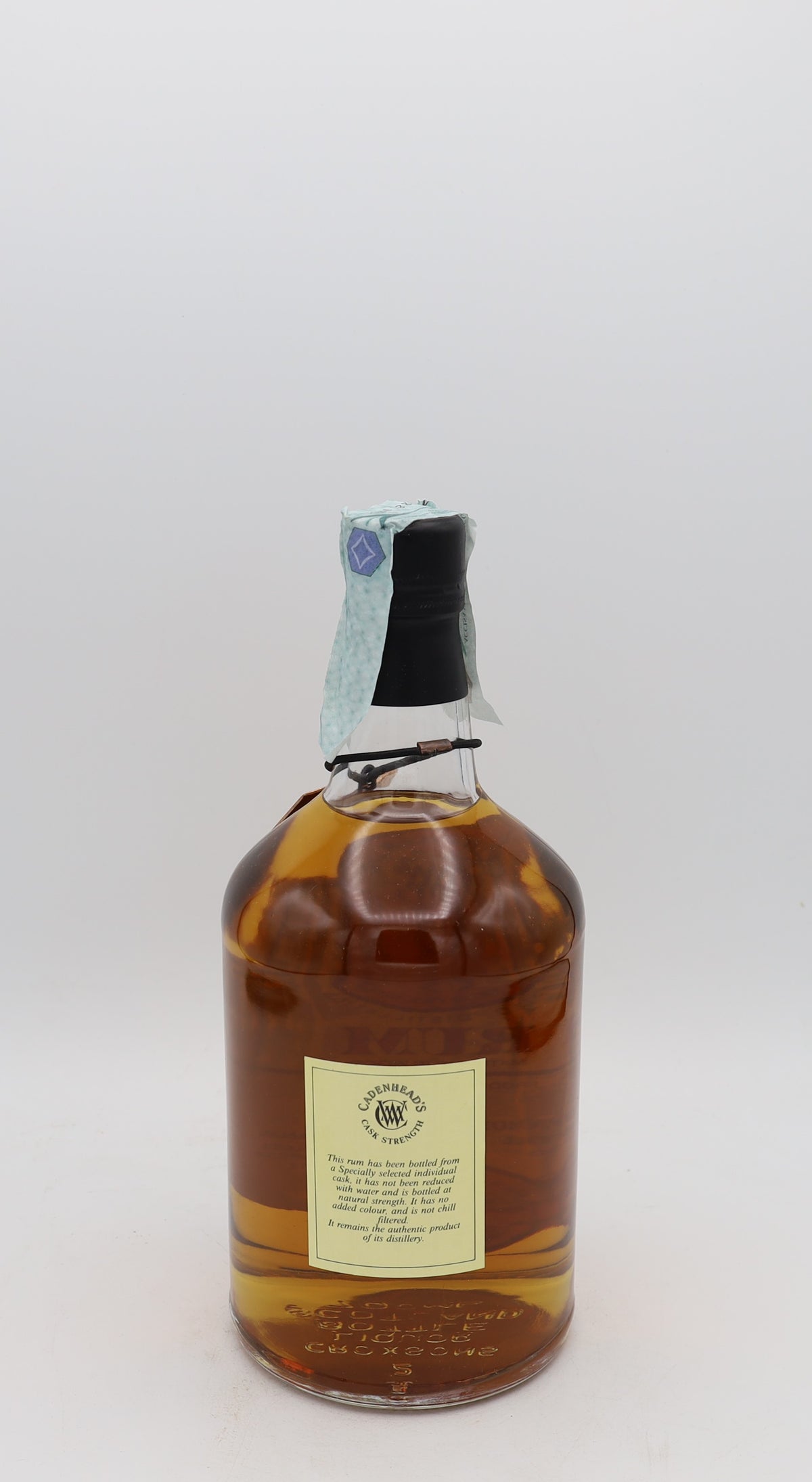 An Enmore MEV Dumpy Guyana Rum Cadenhead’s, 26 years old, presented in a collector’s box – rare aged Caribbean rum with rich, complex flavors.