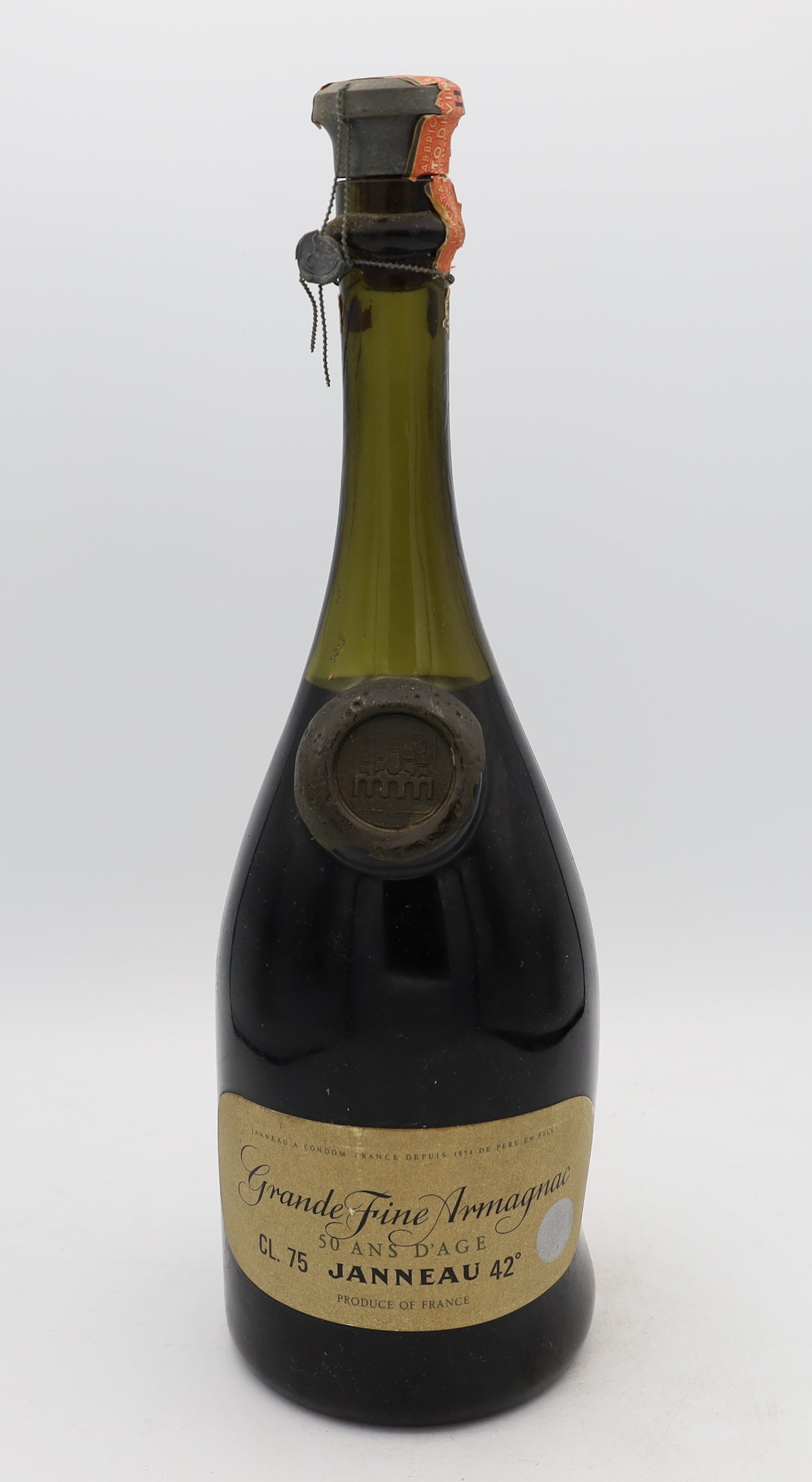 Janneau 50-Year-Old Grande Armagnac – exceptionally rare aged brandy with rich, complex flavors, presented for collectors.