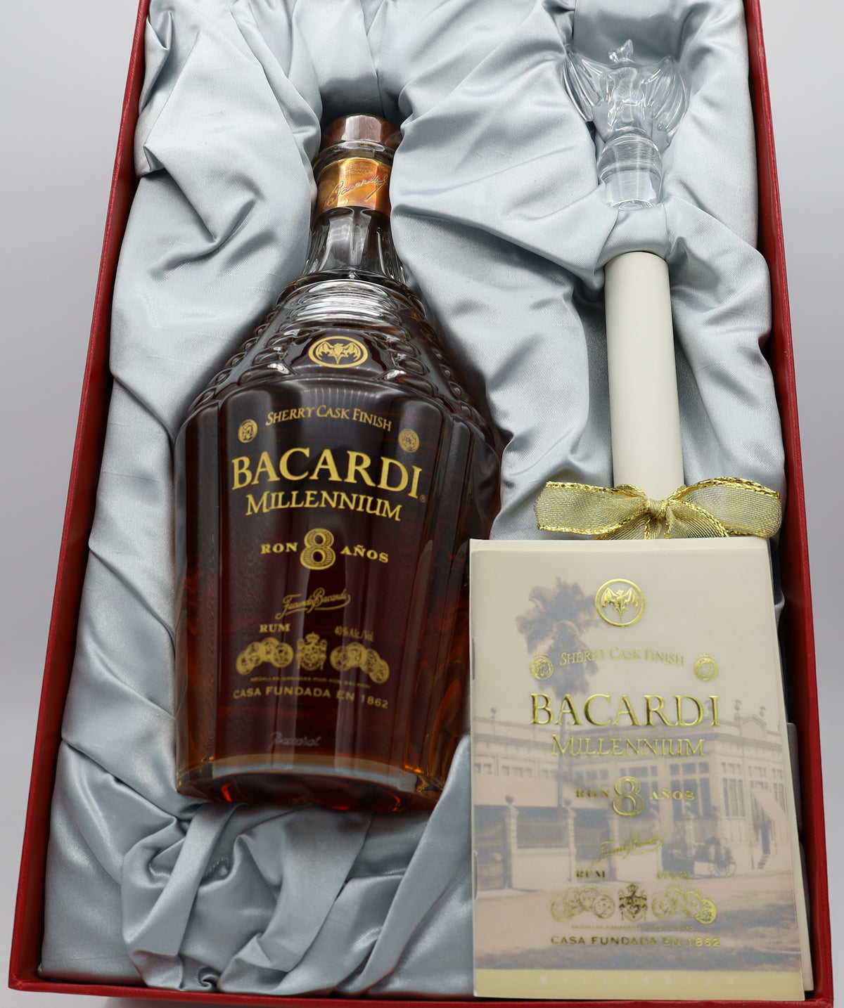 A Bacardi Millennium 8-Year-Old, presented in a Baccarat decanter and collector’s box – rare aged Caribbean rum with smooth, refined flavors.