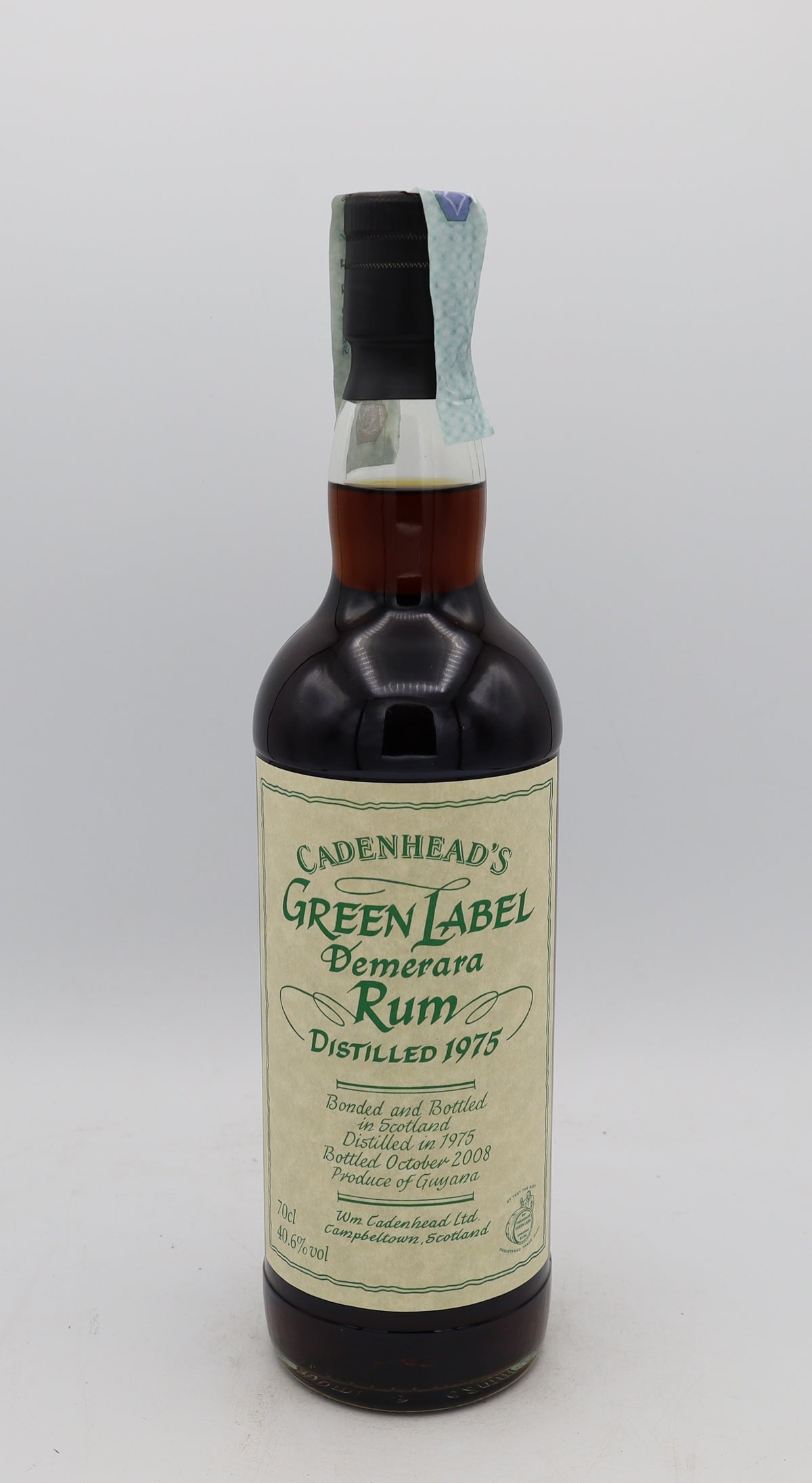 A Cadenhead’s 1977 Green Label Demerara Rum, presented in a collector’s box – rare aged Caribbean rum with rich, complex flavors.