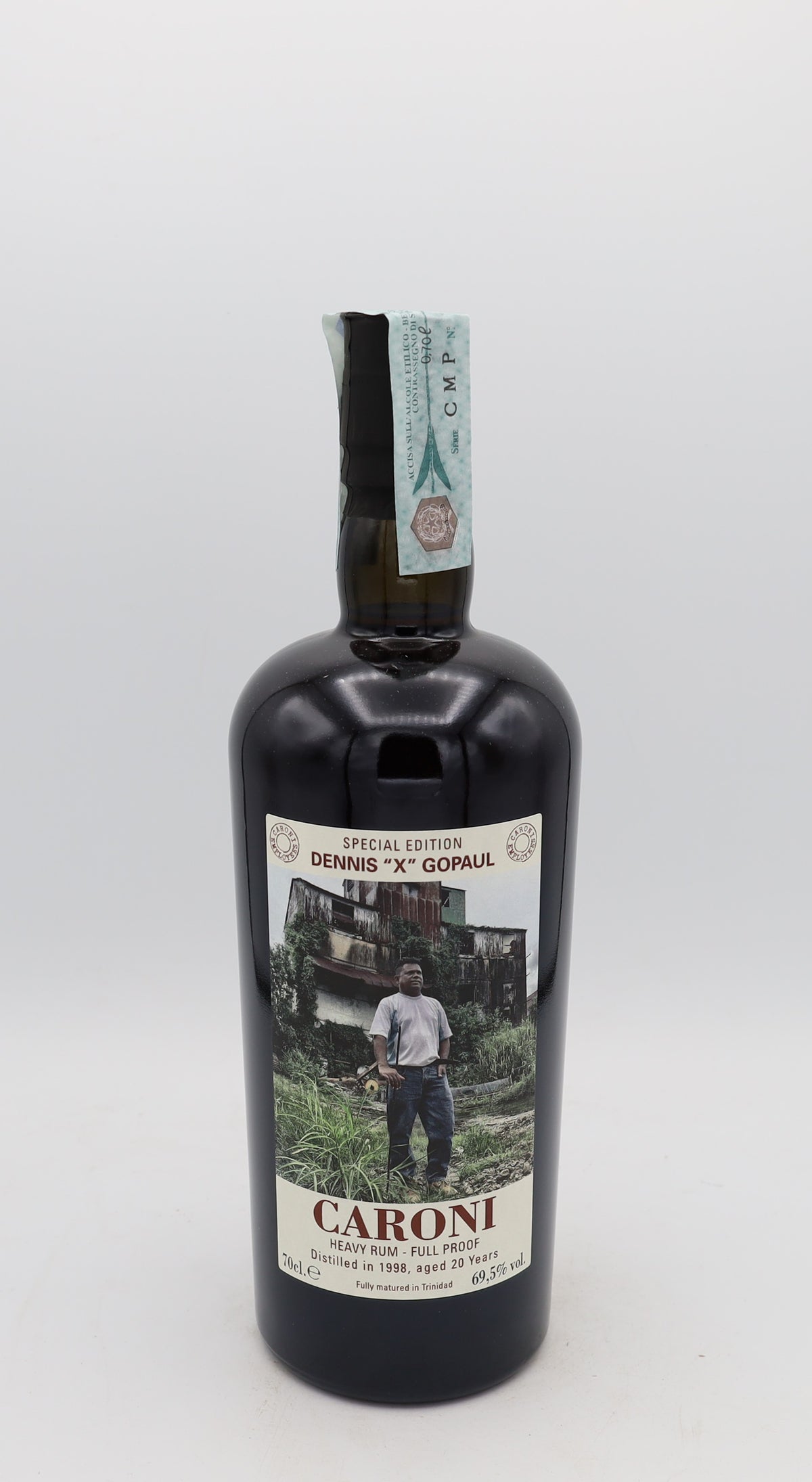 A Caroni 1998 Rum Special Edition Dennis X Gopaul, 20 years old, in a collector’s box – rare aged Caribbean rum with rich, complex flavors.