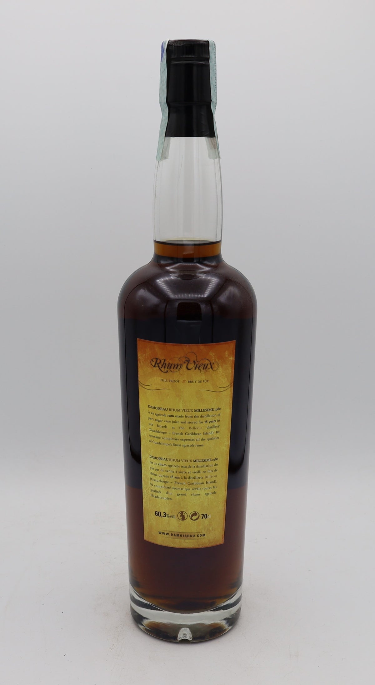 A Damoiseau Rhum Vieux Millésime 1980 Brut de Fut, Reserved Treasures Club edition – rare vintage rum with rich, complex flavors, presented for collectors.