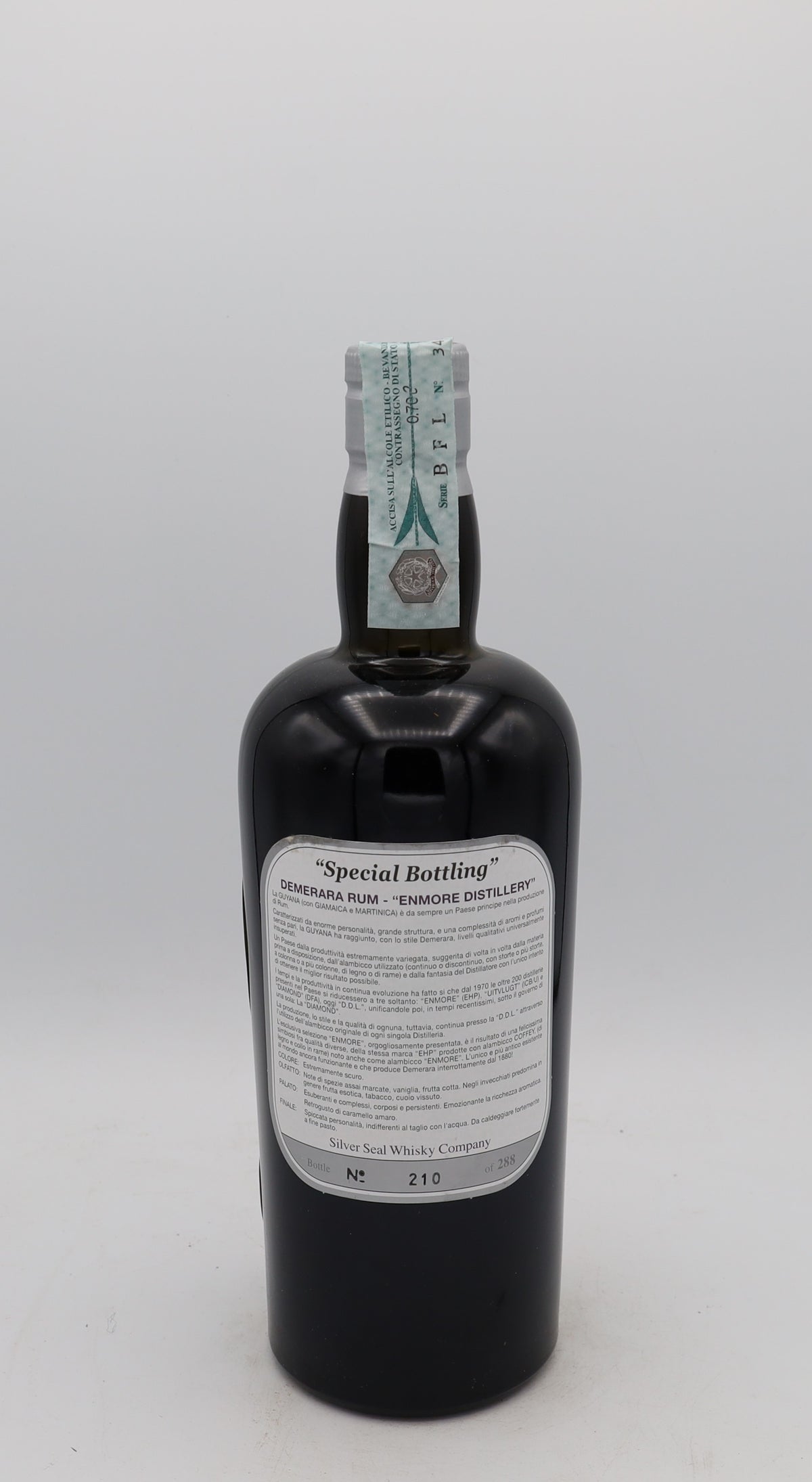 An Enmore 1977 Demerara Rum Ernst Knam Silver Seal, bottle 210, presented in a collector’s box – rare aged Caribbean rum with rich, complex flavors.