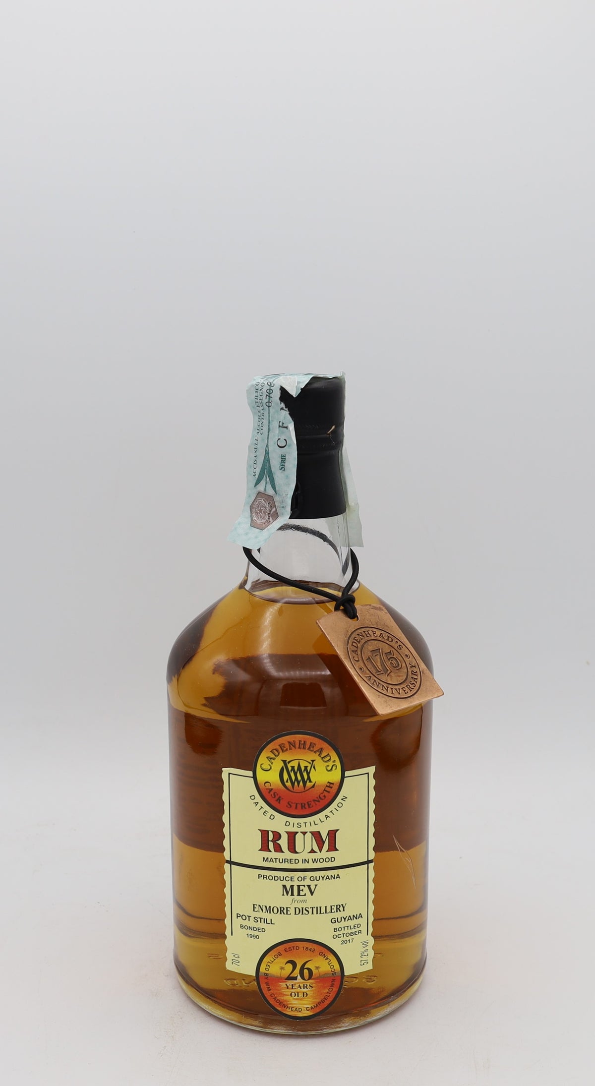 An Enmore MEV Dumpy Guyana Rum Cadenhead’s, 26 years old, presented in a collector’s box – rare aged Caribbean rum with rich, complex flavors.